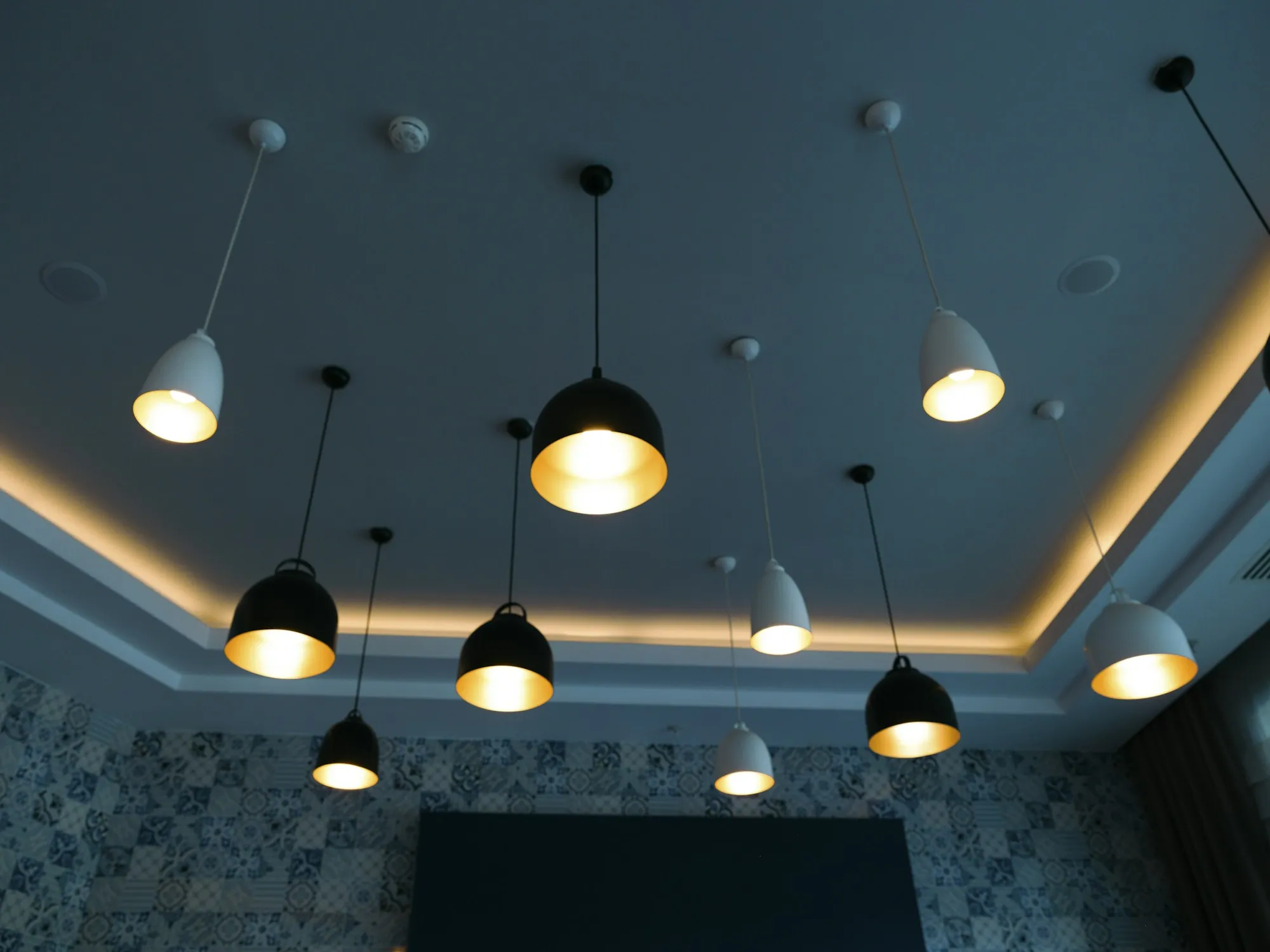 Pendant lights above a residential dining area
