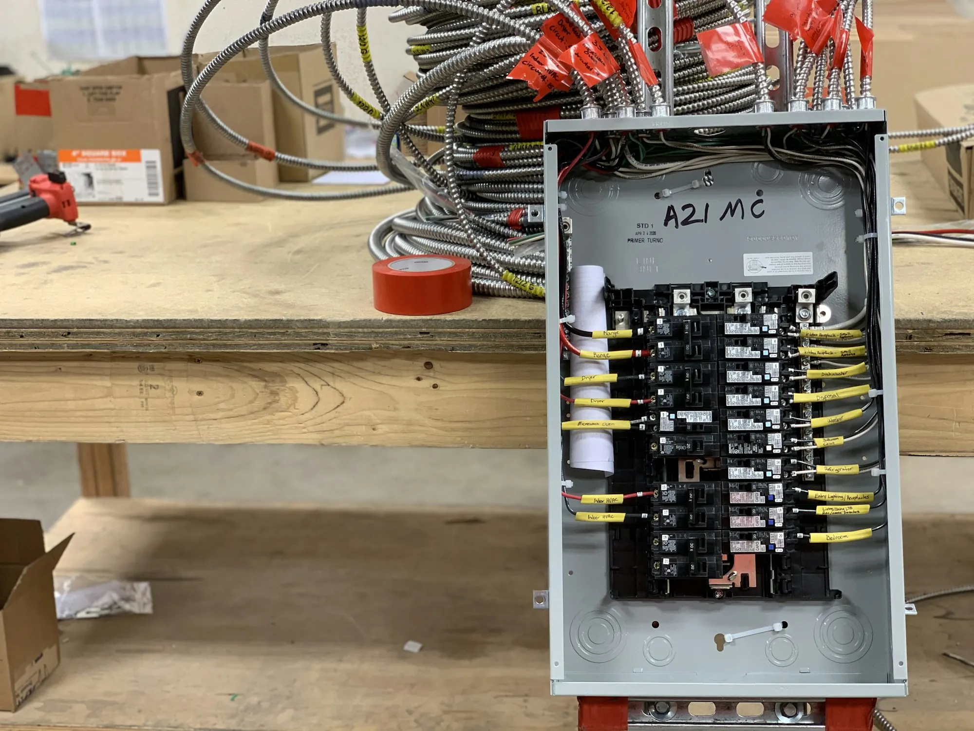 Residential breaker panel opened up to show its breakers